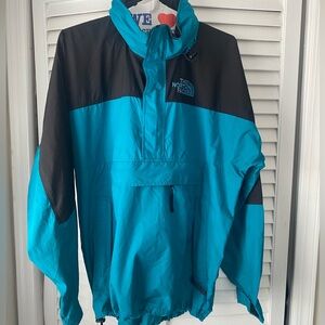 The North Face pocketed pullover Windbreaker , Size Large (Blue/Black)